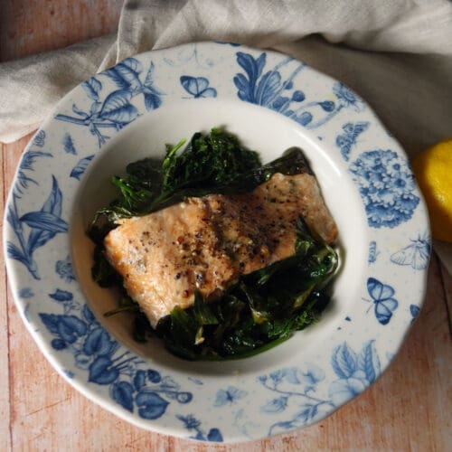 chalkstream trout in wild garlic on spring greens