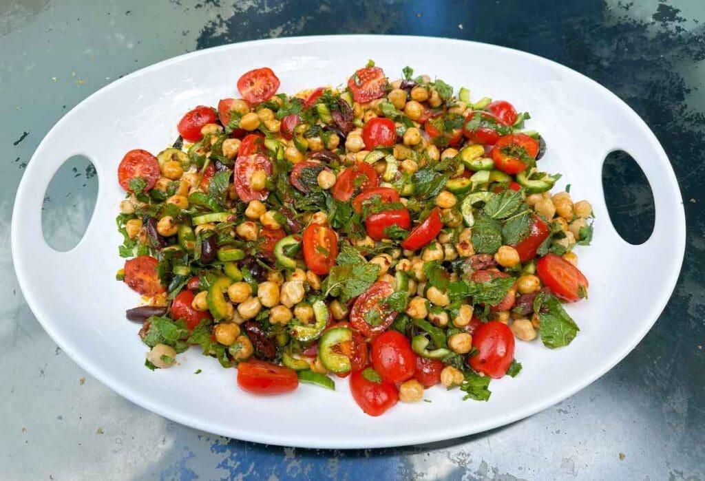 Dinner No cook salad with tomato, chickpeas and rose harissa