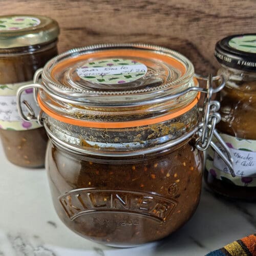 Green tomato chutney in jars