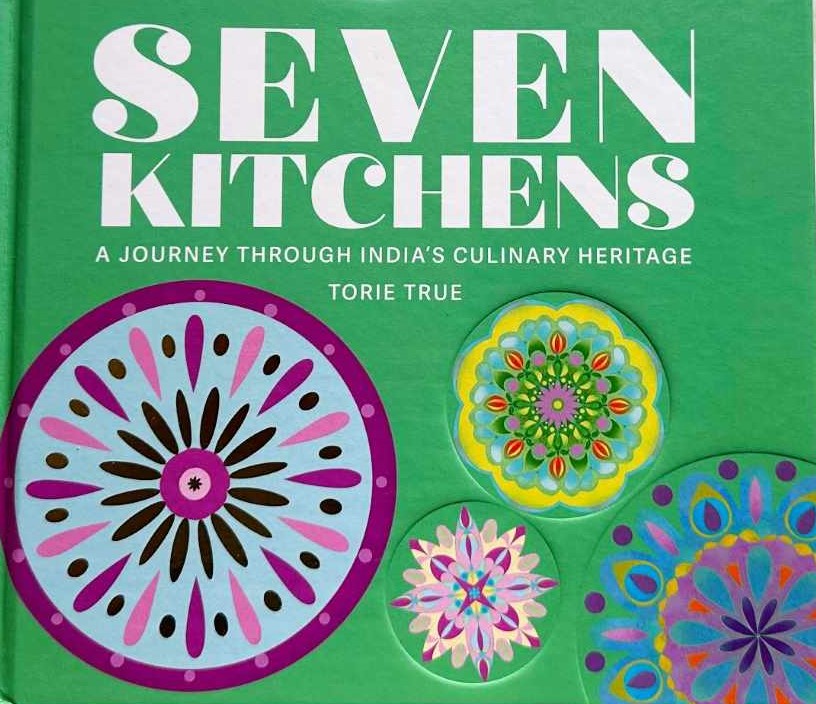 Seven Kitchens has an attractive cover of rangolis, a traditional Indian art form